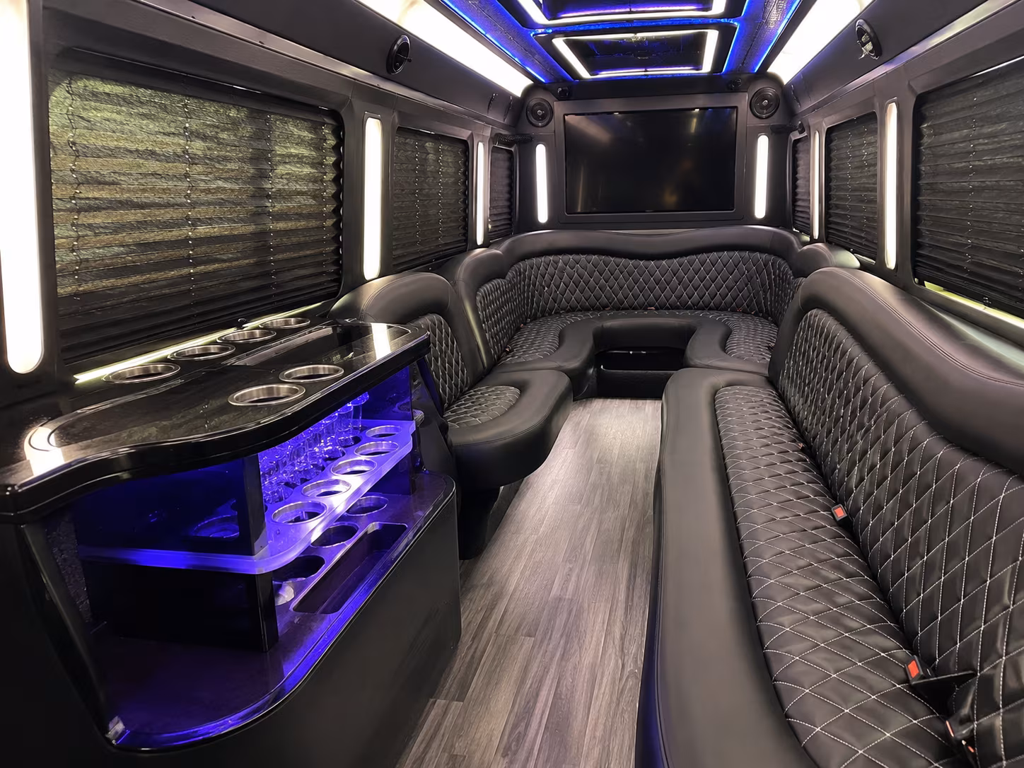 Passenger seating aboard a party bus rental serving Honolulu